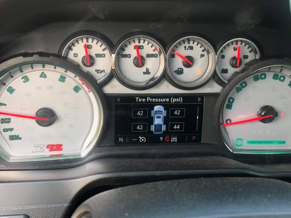 Custom dashboard accents in an American Luxury Coach Silverado